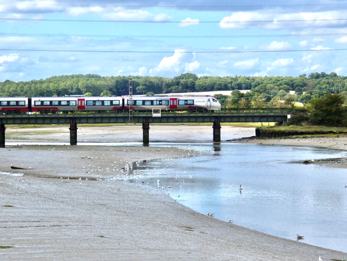  A new Greater Anglia train passing through Manningtree