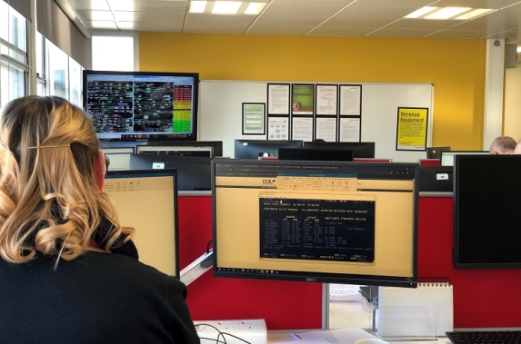 An over the shoulder look of a Greater Anglia staff member in the Shenfield control room