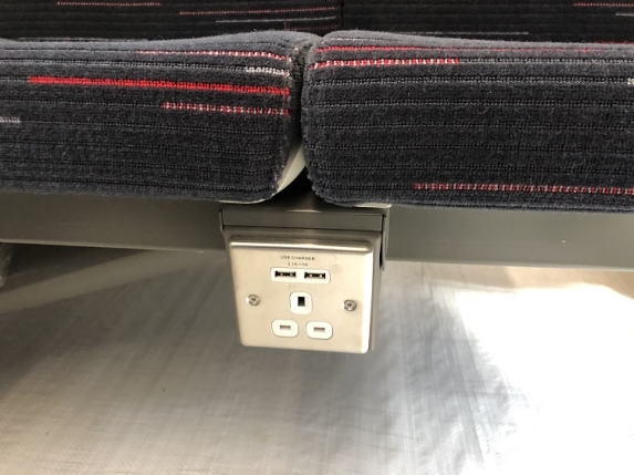 Plug socket in between seats