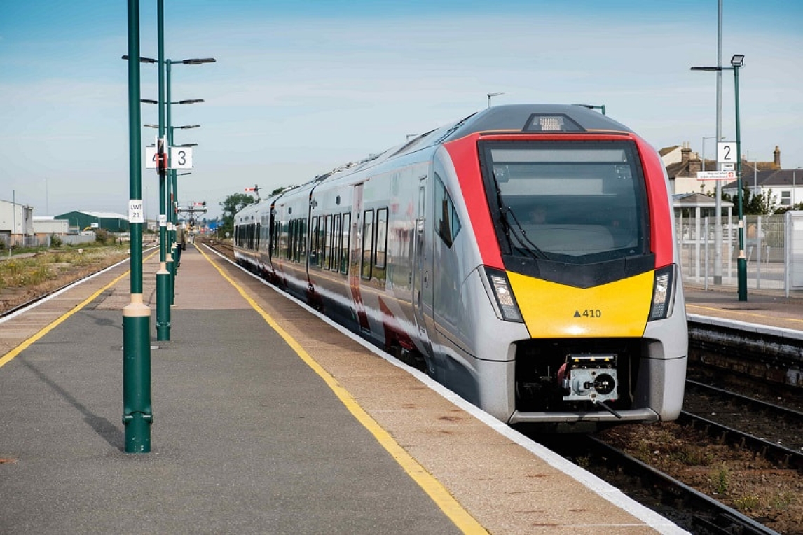 greateranglia new bi-mode train waiting at a station