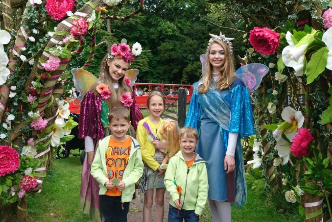 Kids with fairies in a garden